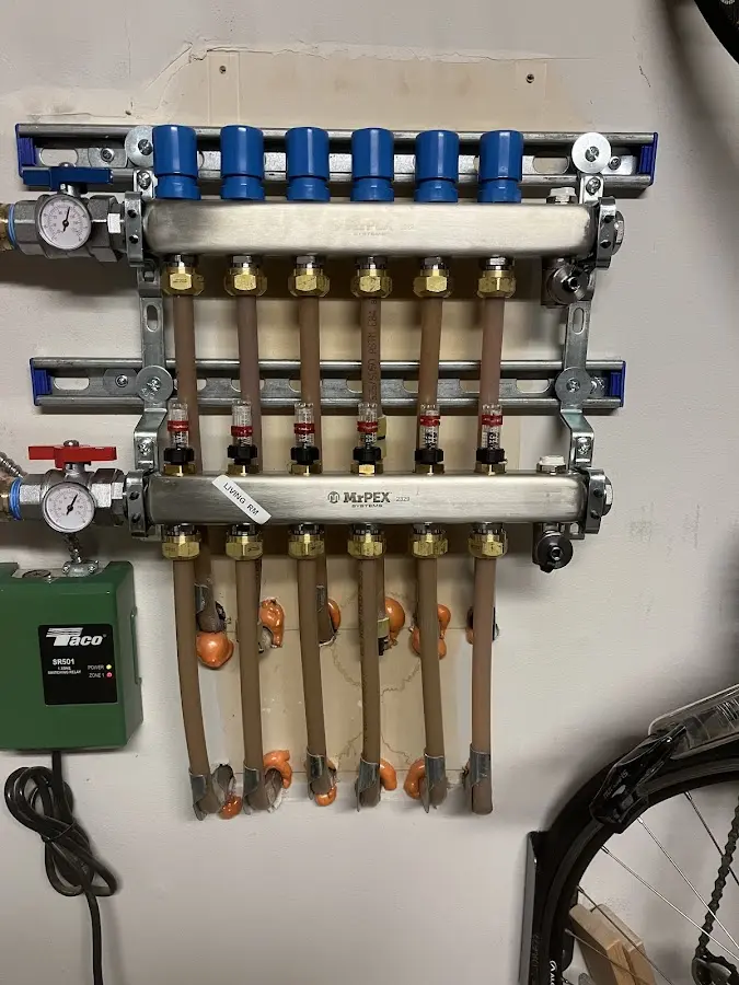 Plumber performing Water Heater Repair at a residential property in Baker